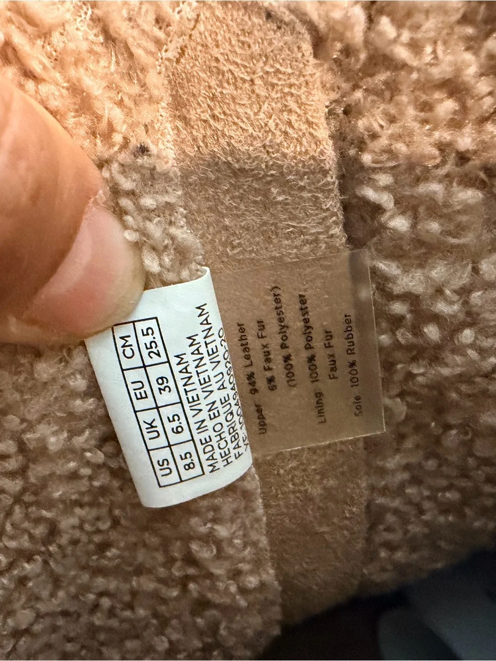 TOMS Black Shearling-Trim Winter Pull-On Boot with Tan Platform